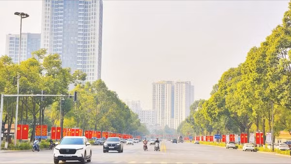 Tuyến đường trung tâm Lê Thái Tổ, phường Kinh Bắc, tỉnh Bắc Ninh rực rỡ cờ hoa chào mừng Đại hội XIV của Đảng.