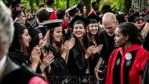 Sinh viên tại Đại học Harvard ở Cambridge, Massachusetts, Mỹ. (Ảnh: THX/TTXVN)