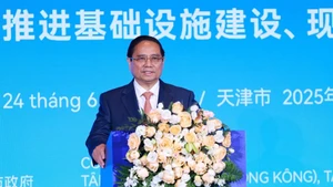 Thủ tướng Phạm Minh Chính phát biểu tại Diễn đàn kết nối doanh nghiệp Việt Nam-Trung Quốc. (Ảnh: Dương Giang/TTXVN)
