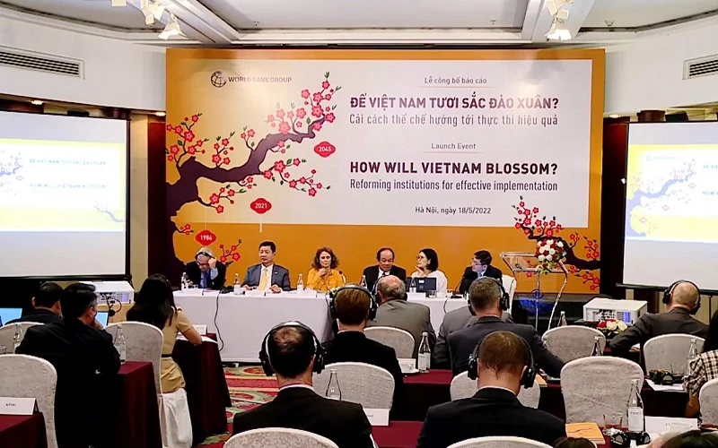 Toàn cảnh lễ công bố báo cáo “Để Việt Nam tươi sắc đào xuân? Cải cách thể chế hướng tới thực thi hiệu quả” của WB.