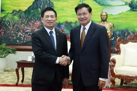 Phó Thủ tướng Hồ Đức Phớc hội kiến Tổng Bí thư, Chủ tịch nước Lào Thongloun Sisoulith. (Ảnh: DUY TOÀN)