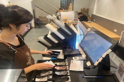 Cục Thuế đề nghị các tổ chức phối hợp cơ quan thuế để tuyên truyền về lợi ích, quy trình đăng ký và sử dụng hóa đơn điện tử từ máy tính tiền. (Ảnh: MINH PHƯƠNG)