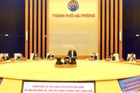 Quang cảnh buổi làm việc của Phó Thủ tướng Thường trực Chính phủ Nguyễn Hòa Bình cùng đoàn công tác của Chính phủ với lãnh đạo thành phố Hải Phòng. (Ảnh: DUY THÍNH)