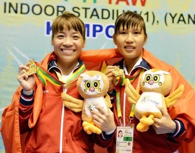 Phạm Thị Mão (trái) và Phan Thị Kiều Duyên đã mang về tấm HCV đầu tiên cho Kempo Việt Nam.