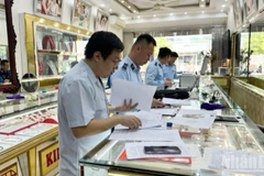 Tổ chức thanh tra việc chấp hành pháp luật của các doanh nghiệp kinh doanh vàng. (Ảnh: VGP)