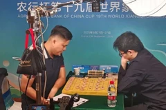 Ngày 27/9, kỳ thủ số 1 Việt Nam Lại Lý Huynh đã đánh bại đối thủ Doãn Thăng, lần đầu tiên giành ngôi vô địch nội dung cờ tiêu chuẩn tại Giải Vô địch cờ tướng thế giới 2025. (Ảnh: TTXVN)
