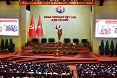 Phiên thảo luận tại hội trường về các văn kiện Đại hội, chiều 21/1. (Ảnh: TTXVN)