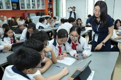 Giáo viên và học sinh trong một tiết học. (Ảnh minh họa)