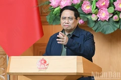 Thủ tướng Chính phủ Phạm Minh Chính phát biểu ý kiến chỉ đạo tại cuộc họp khẩn bàn giải pháp khắc phục hậu quả mưa lũ lịch sử ở miền trung. (Ảnh: Trần Hải)