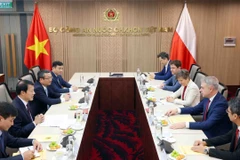 Đại tướng Lương Tam Quang, Bộ trưởng Công an tiếp Phó Thủ tướng, Bộ trưởng Bộ Kỹ thuật số Cộng hòa Ba Lan Krzysztof Gawkowski. (Ảnh: Phạm Kiên/TTXVN)