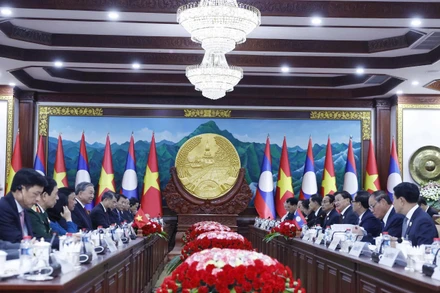 Tổng Bí thư Tô Lâm hội đàm với Tổng Bí thư, Chủ tịch nước Lào Thongloun Sisoulith. (Ảnh: Thống Nhất/TTXVN)