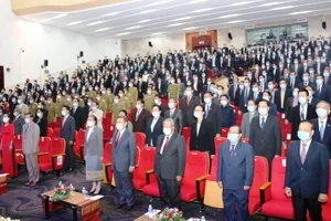 Lễ chào cờ với sự tham dự của hơn 500 đại biểu Lào và Việt Nam tại Thủ đô Vientiane, Lào, ngày 2-9.