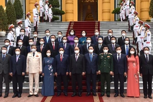 Chủ tịch nước Nguyễn Xuân Phúc, Thủ tướng Phạm Minh Chính, Chủ tịch Quốc hội Vương Đình Huệ và các thành viên Chính phủ, các đại biểu tại buổi lễ. (Ảnh: TRẦN HẢI)