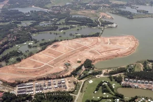 Hàng trăm ha lòng hồ Đại Lải bị Công ty TNHH Đại Lải Việt Nam bức tử.