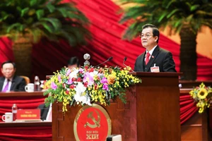 Đồng chí Lê Hồng Quang, Ủy viên Trung ương Đảng, Phó Chánh án Thường trực Tòa án nhân dân tối cao trình bày tham luận. Ảnh: tuấn anh - DUY LINH