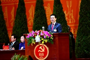 Đồng chí Nguyễn Mạnh Hùng, Ủy viên Trung ương Đảng, Bộ trưởng Thông tin và Truyền thông trình bày tham luận. (Ảnh: DUY LINH)