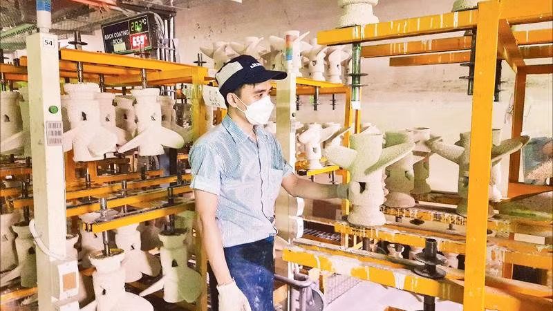 Hoạt động sản xuất tại Công ty TNHH Juki Việt Nam, Khu chế xuất Tân Thuận, Thành phố Hồ Chí Minh.