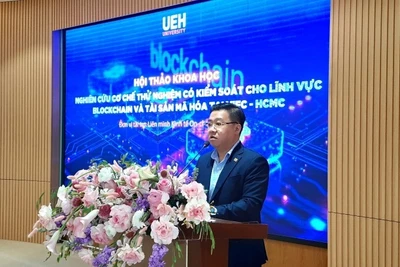 Đại diện lãnh đạo Đại học Kinh tế Thành phố Hồ Chí Minh phát biểu tại hội thảo.
