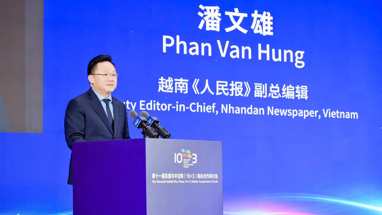 Đồng chí Phan Văn Hùng, Phó Tổng Biên tập Báo Nhân Dân phát biểu đề dẫn tại hội thảo. (Ảnh: Nhân dân nhật báo) gen-h-05.jpg