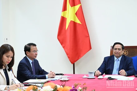 Thủ tướng Chính phủ Phạm Minh Chính điện đàm với Thủ tướng kiêm Bộ trưởng Ngoại giao Nhà nước Qatar Sheikh Mohammed bin Abdulrahman bin Jasim Al-Thani. (Ảnh: TRẦN HẢI)