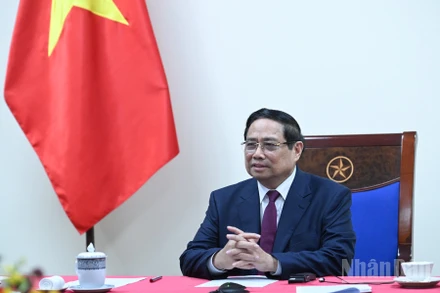 Thủ tướng Chính phủ Phạm Minh Chính điện đàm với Thủ tướng Algeria Sifi Ghrieb. (Ảnh: Trần Hải)