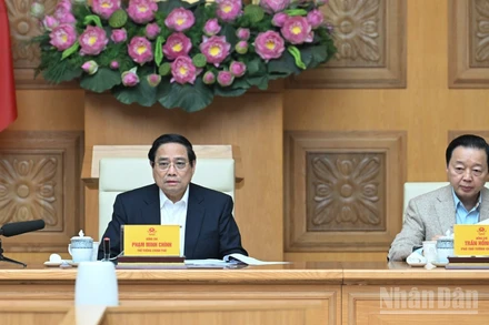 Thủ tướng Chính phủ Phạm Minh Chính chủ trì cuộc họp bàn giải pháp đẩy nhanh tiến độ triển khai "Chiến dịch Quang Trung" thần tốc xây dựng, sửa chữa nhà ở cho nhân dân. (Ảnh: Trần Hải)