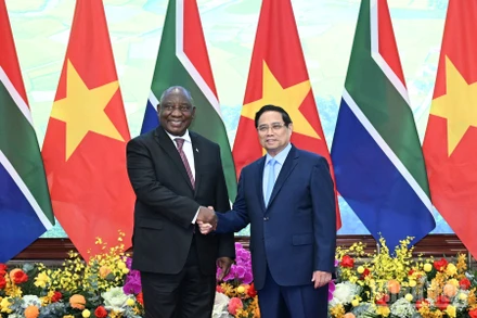 Thủ tướng Chính phủ Phạm Minh Chính và Tổng thống Cộng hòa Nam Phi Cyril Ramaphosa. (Ảnh: TRẦN HẢI) 