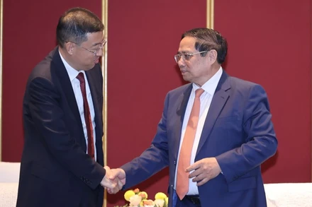 Thủ tướng Phạm Minh Chính tiếp ông Cát Hải Kiều, Chủ tịch Hội đồng Quản trị Ngân hàng Trung Quốc (BOC). Ảnh: VGP/Nhật Bắc