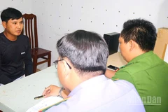 Trần Thanh Nhàn tại cơ quan công an.