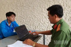 Khúc Văn Thanh tại cơ quan công an.