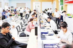 Hoạt động mô hình chính quyền địa phương hai cấp tại phường Thanh Khê (thành phố Đà Nẵng). (Ảnh: CÔNG VINH)