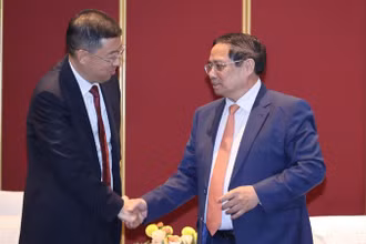 Thủ tướng Phạm Minh Chính tiếp ông Cát Hải Kiều, Chủ tịch Hội đồng Quản trị Ngân hàng Trung Quốc (BOC). Ảnh: VGP/Nhật Bắc