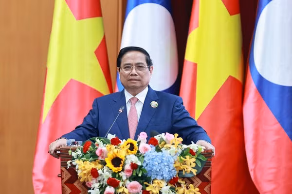 Thủ tướng Chính phủ Phạm Minh Chính phát biểu ý kiến tại Hội nghị Xúc tiến đầu tư Việt Nam - Lào. (Ảnh: VGP/Nhật Bắc)