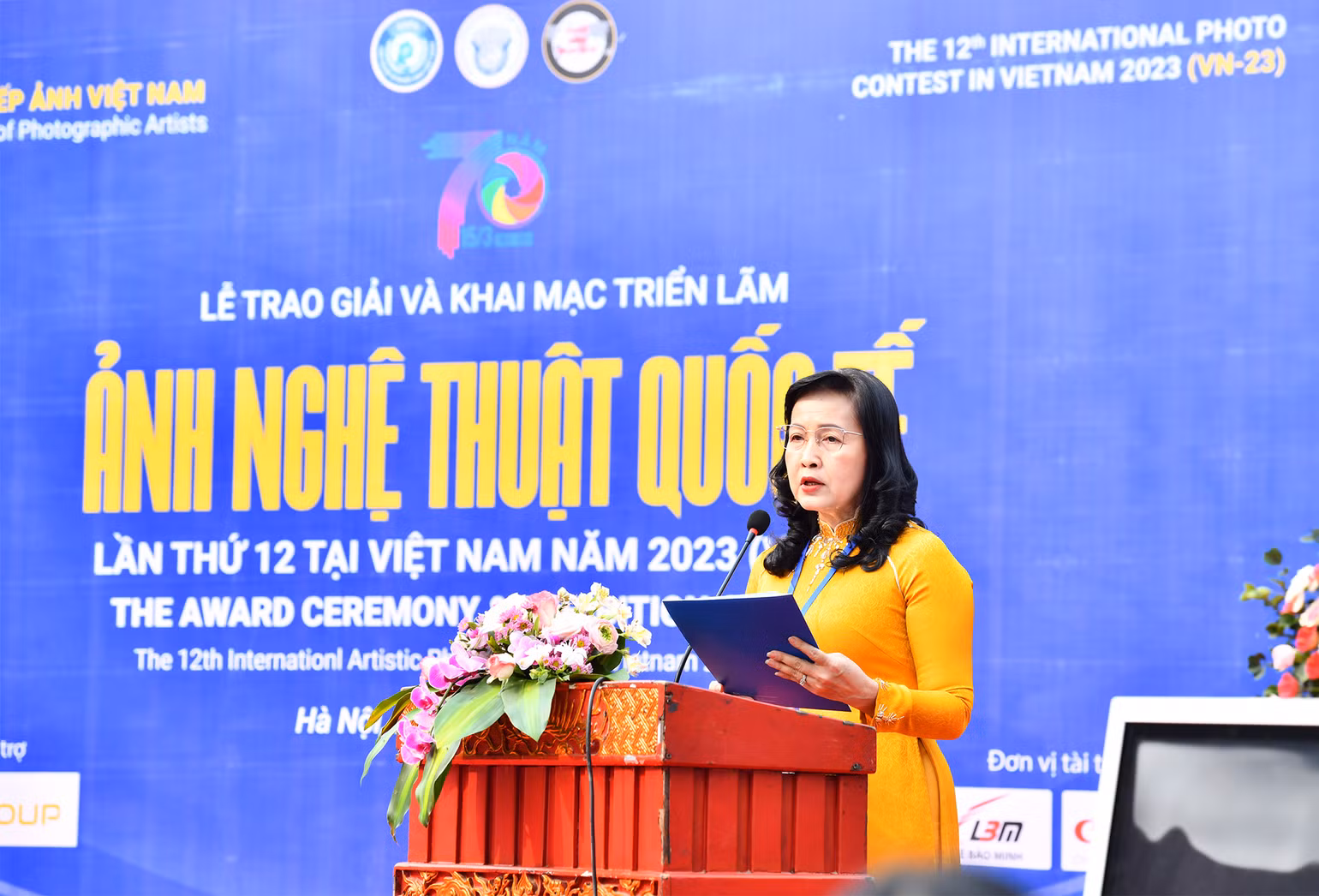 Nghệ sĩ Nhiếp ảnh Trần Thị Thu Đông, Phó Chủ tịch Liên hiệp các hội văn học nghệ thuật Việt Nam, Chủ tịch Hội Nghệ sĩ Nhiếp ảnh Việt Nam phát biểu khai mạc triển lãm.