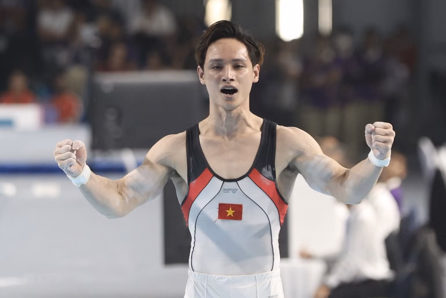Niềm vui của Đinh Phương Thành sau khi giành Huy chương Vàng. (Ảnh: TTXVN)