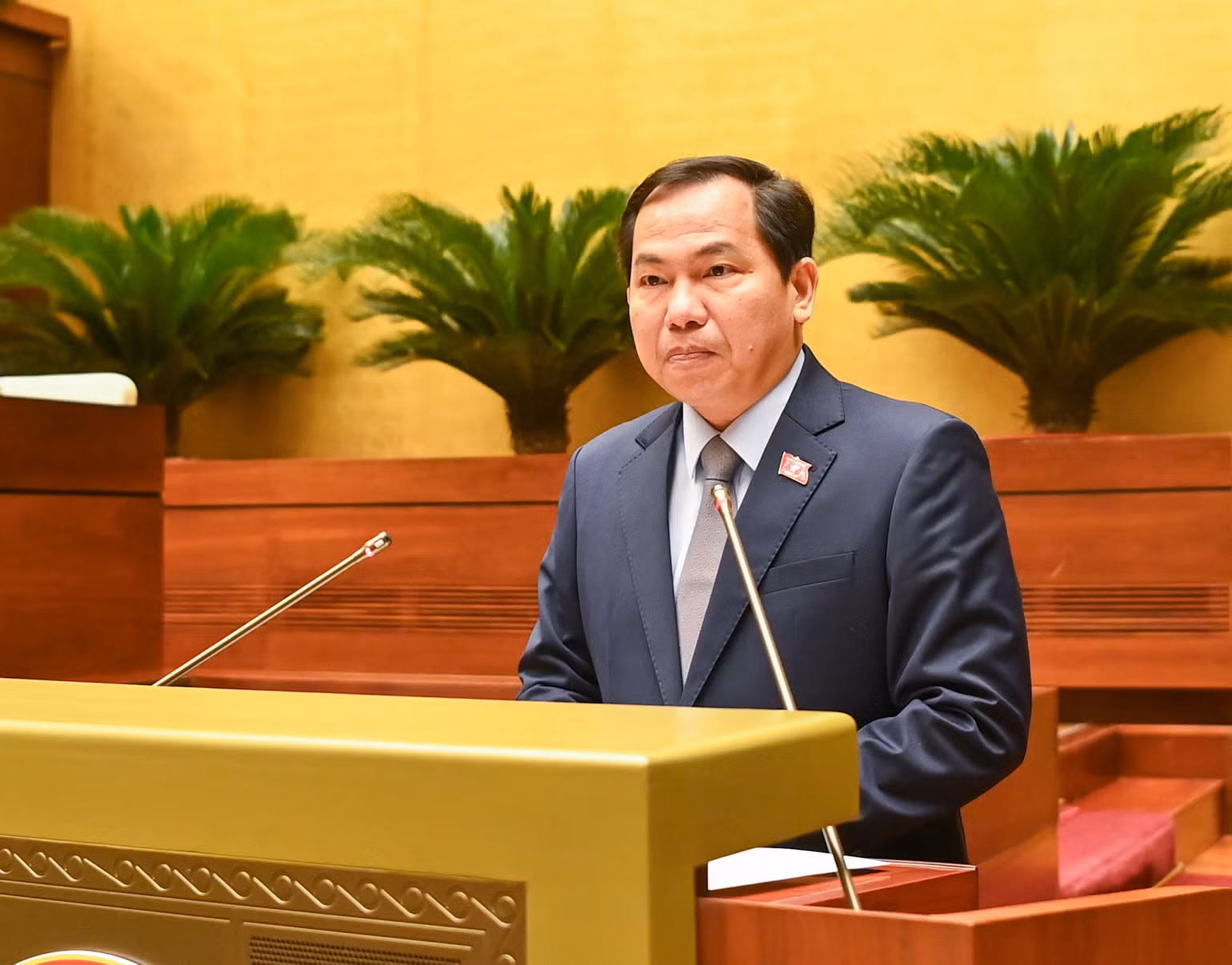 Chủ nhiệm Ủy ban Tài chính, Ngân sách của Quốc hội Lê Quang Mạnh trình bày báo cáo tiếp thu, giải trình và chỉnh lý dự thảo Nghị quyết. (Ảnh: DUY LINH)