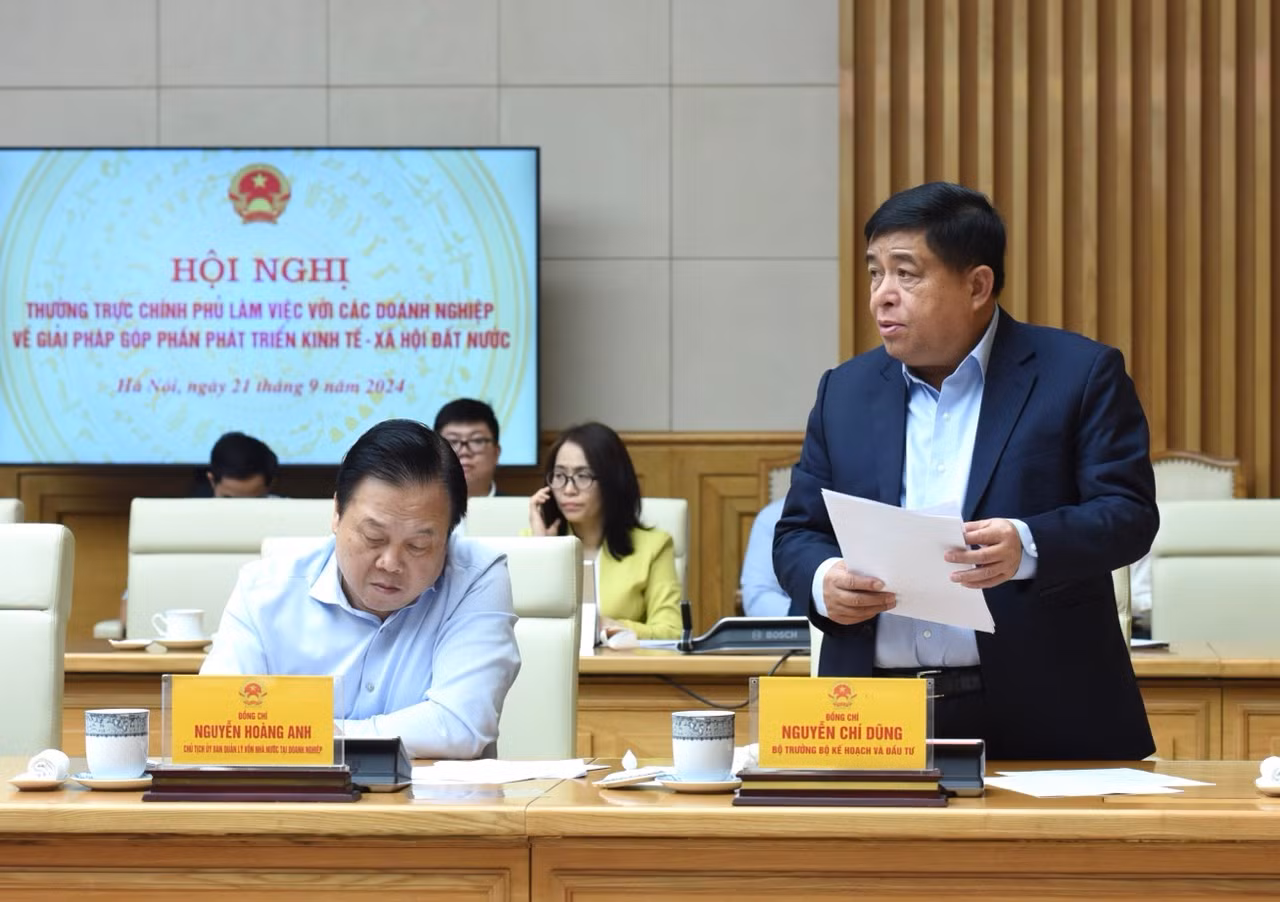 Bộ trưởng Kế hoạch và Đầu tư Nguyễn Chí Dũng phát biểu ý kiến tại hội nghị. (Ảnh: TRẦN HẢI)