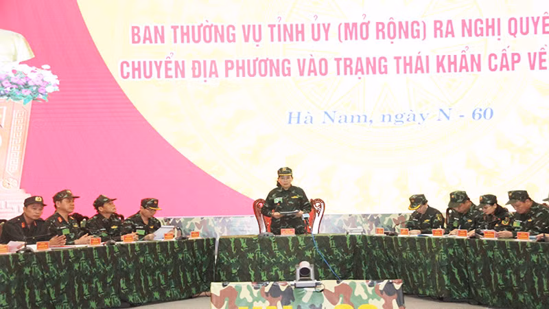 Diễn tập vận hành cơ chế: Hội nghị Ban Thường vụ Tỉnh ủy (mở rộng) ra Nghị quyết chuyển địa phương vào trạng thái khẩn cấp về quốc phòng. Diễn tập vận hành cơ chế: Hội nghị Ban Thường vụ Tỉnh ủy (mở rộng) ra Nghị quyết chuyển địa phương vào trạng thái khẩn cấp về quốc phòng.