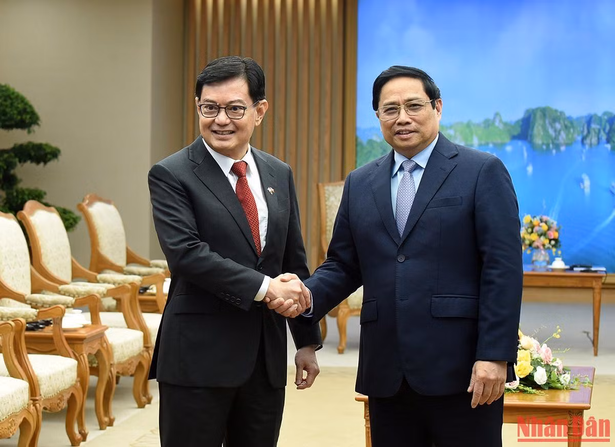 Thủ tướng Phạm Minh Chính và Phó Thủ tướng Singapore Vương Thụy Kiệt tại buổi tiếp.