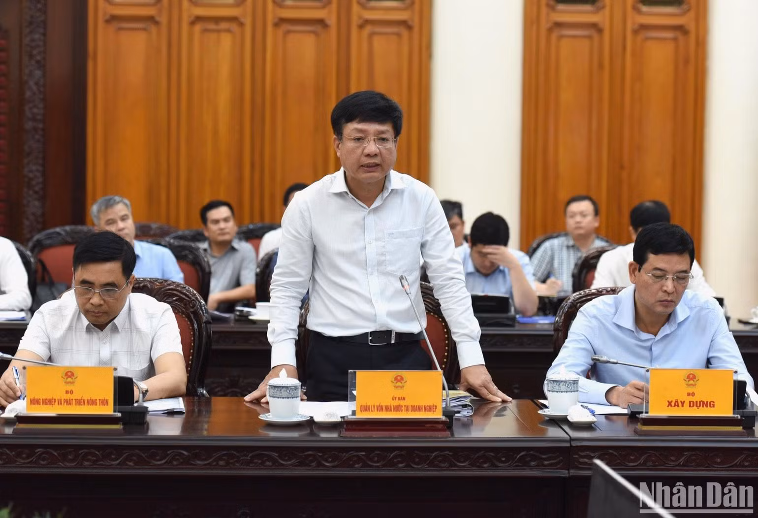 Đại diện lãnh đạo Ủy ban Quản lý vốn nhà nước tại doanh nghiệp phát biểu. (Ảnh: TRẦN HẢI)