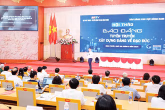 Các đại biểu tham dự hội thảo “Báo Đảng tuyên truyền xây dựng Đảng về đạo đức” được tổ chức ngày 8/8 tại Bình Phước.