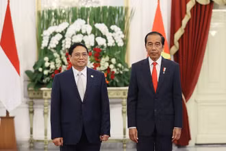 Thủ tướng Phạm Minh Chính hội kiến Tổng thống Indonesia Joko Widodo. (Ảnh: Dương Giang/TTXVN)