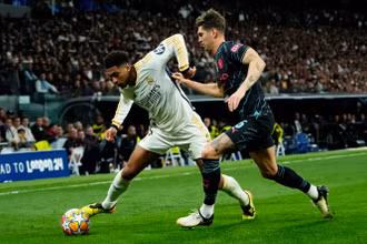 Thế trận đôi công hấp dẫn được Real Madrid và Manchester City tạo ra. (Ảnh: The Week)