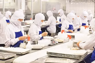 Lao động tại Công ty cổ phần Thực phẩm Agrex Saigon. (Ảnh: Phương Vy)