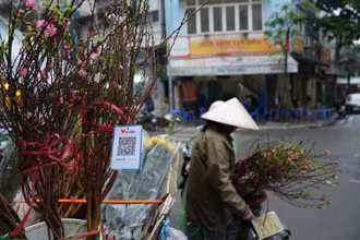 Số lượng giao dịch chuyển tiền tăng cao trong dịp Tết. (Ảnh minh họa)