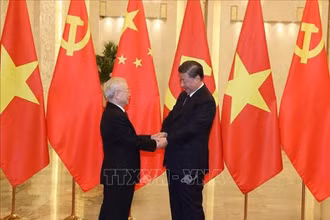 Tổng Bí thư, Chủ tịch Trung Quốc Tập Cận Bình đón Tổng Bí thư Nguyễn Phú Trọng. (Ảnh: Trí Dũng - TTXVN)