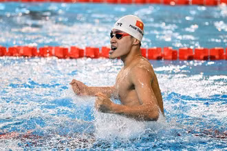 Ảnh minh họa: Vận động viên Phạm Thanh Bảo đoạt Huy chương Vàng và phá kỷ lục SEA Games ở nội dung 100 m bơi ếch với thành tích 1 phút 1 giây 17. (Ảnh: TIẾN TUẤN)