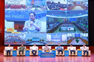 Thủ tướng Phạm Minh Chính đối thoại với 4.500 công nhân trong chương trình với chủ đề “Công nhân Việt Nam với khát vọng phát triển đất nước” năm 2022.