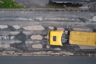 Tuyến Quốc lộ 51 qua địa phận phường An Hòa, thành phố Biên Hòa với nhiều ổ voi, ổ gà.