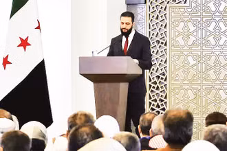 Tổng thống lâm thời Syria phát biểu tại hội nghị đối thoại quốc gia. 